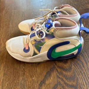 Nike women’s  Cream and Blue basketball shoes